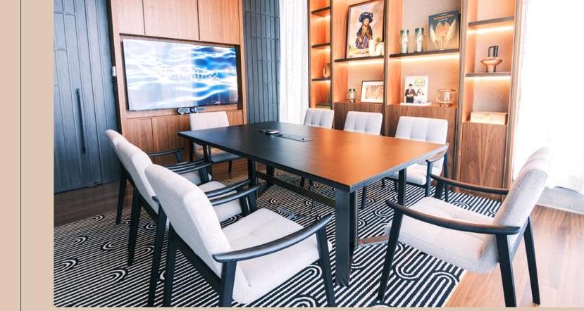 The Harbour View Room, a boardroom table beneath floor-to-ceiling windows